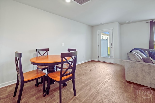 206 Coneflower Rd, Bloomingdale, GA 31302 - dining area featuring light wood-style floors and baseboards