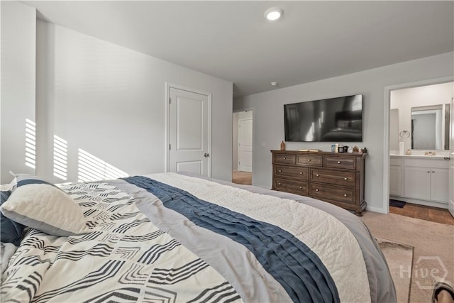 206 Coneflower Rd, Bloomingdale, GA 31302 - bedroom featuring light colored carpet and connected bathroom