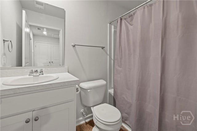 206 Coneflower Rd, Bloomingdale, GA 31302 - bathroom with vanity, shower / bath combination with curtain, and wood finished floors