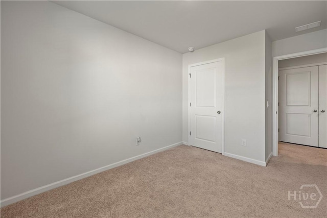 206 Coneflower Rd, Bloomingdale, GA 31302 - unfurnished bedroom with light carpet and baseboards