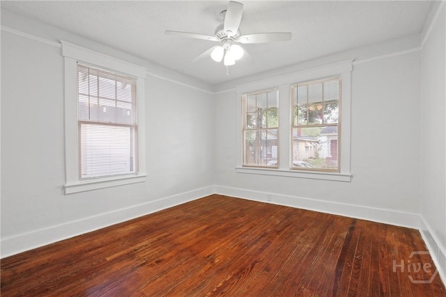 1122 SE 36th St, Savannah, GA 31404 - unfurnished room with healthy amount of natural light, dark wood-style floors, and a ceiling fan