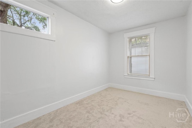 1122 SE 36th St, Savannah, GA 31404 - spare room featuring light carpet and baseboards