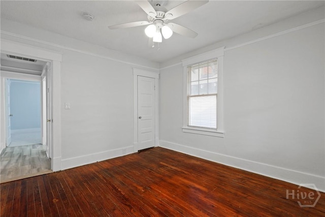 1122 SE 36th St, Savannah, GA 31404 - empty room featuring a smoke detector, dark wood-style flooring, and a ceiling fan