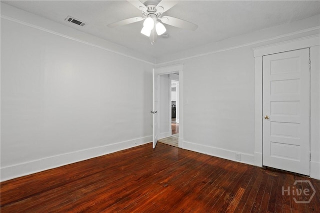 1122 SE 36th St, Savannah, GA 31404 - spare room with dark wood-type flooring and ceiling fan
