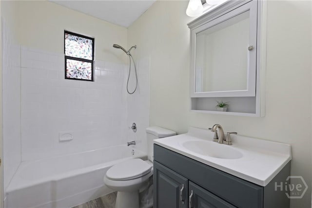 1122 SE 36th St, Savannah, GA 31404 - full bath featuring vanity, bathtub / shower combination, and wood finished floors