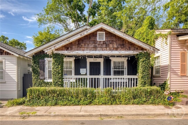 531 E 31st St, Savannah, GA 31401 - view of front of property featuring a porch