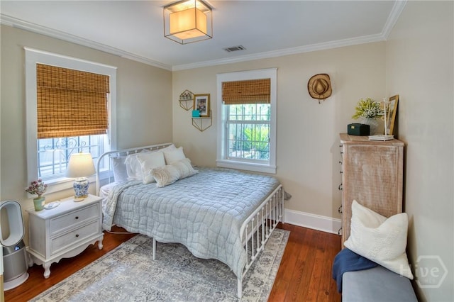 531 E 31st St, Savannah, GA 31401 - bedroom featuring multiple windows, ornamental molding, and wood finished floors