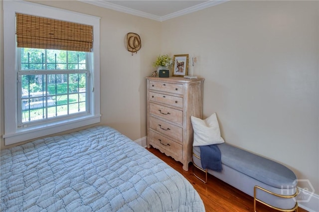 531 E 31st St, Savannah, GA 31401 - bedroom with multiple windows, dark wood-style flooring, and crown molding
