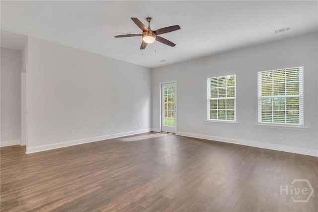 102 Simon Cir, Guyton, GA 31312 - empty room featuring dark wood finished floors and ceiling fan