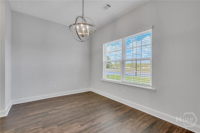 102 Simon Cir, Guyton, GA 31312 - unfurnished room featuring a chandelier and dark wood-style floors