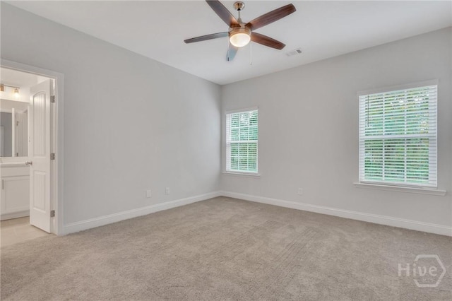 102 Simon Cir, Guyton, GA 31312 - spare room with light colored carpet and ceiling fan