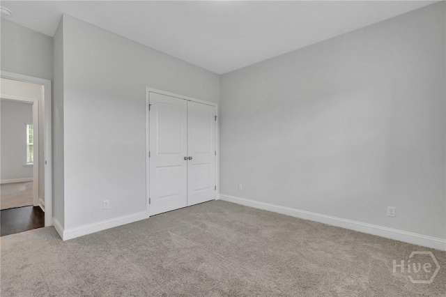 102 Simon Cir, Guyton, GA 31312 - unfurnished bedroom featuring carpet floors and a closet