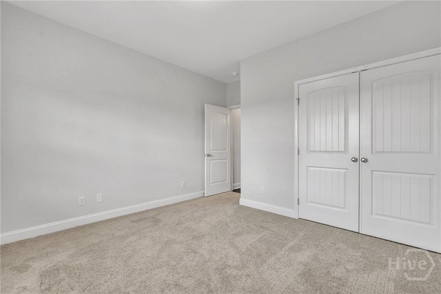 102 Simon Cir, Guyton, GA 31312 - unfurnished bedroom featuring carpet and a closet