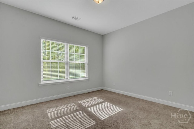 102 Simon Cir, Guyton, GA 31312 - carpeted empty room with baseboards