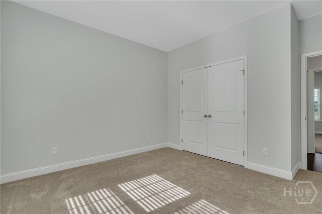 102 Simon Cir, Guyton, GA 31312 - unfurnished bedroom featuring carpet floors and a closet