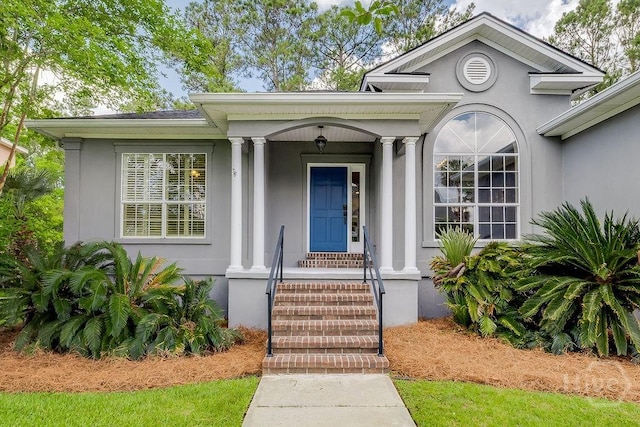 7 Settlers Pt, Savannah, GA 31406 - view of exterior entry with stucco siding