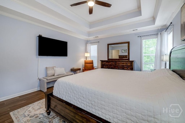 7 Settlers Pt, Savannah, GA 31406 - bedroom featuring multiple windows, wood finished floors, ceiling fan, a tray ceiling, and ornamental molding