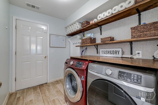 7 Settlers Pt, Savannah, GA 31406 - laundry area with washing machine and dryer and light wood finished floors