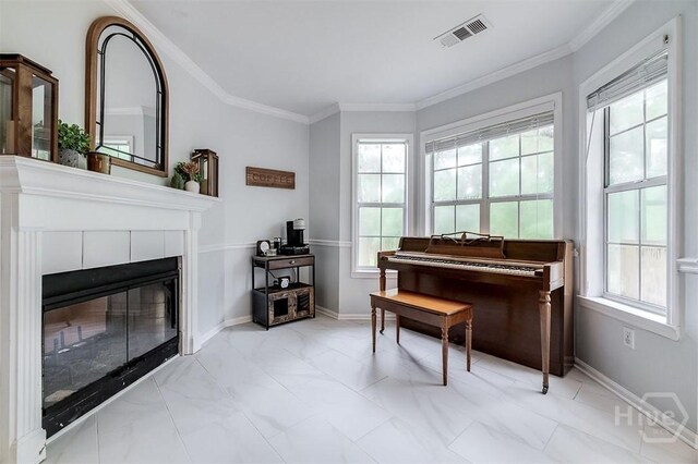 7 Settlers Pt, Savannah, GA 31406 - sitting room featuring a tile fireplace, healthy amount of natural light, crown molding, and marble finish flooring