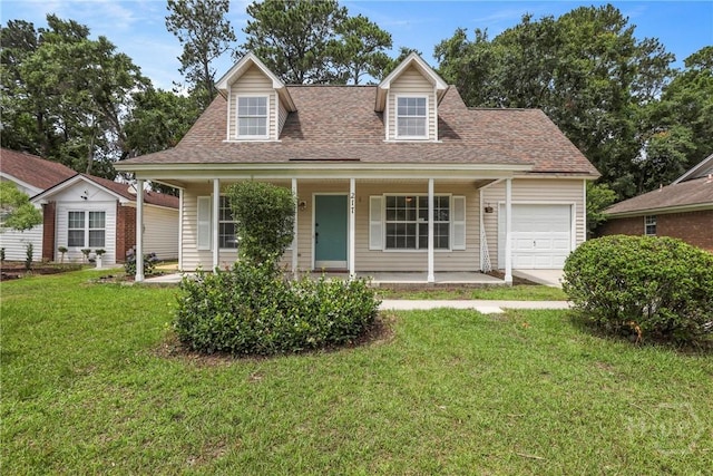 217 Bordeaux Ln, Savannah, GA 31419 - cape cod-style house with a garage, covered porch, a front lawn, and a shingled roof