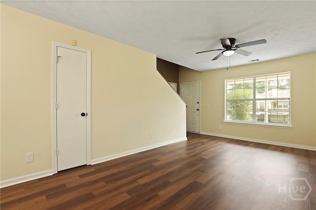 217 Bordeaux Ln, Savannah, GA 31419 - unfurnished room featuring dark wood-style flooring and a ceiling fan