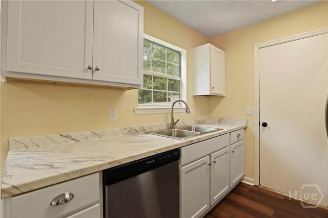 217 Bordeaux Ln, Savannah, GA 31419 - kitchen with stainless steel dishwasher, dark wood-type flooring, and white cabinets