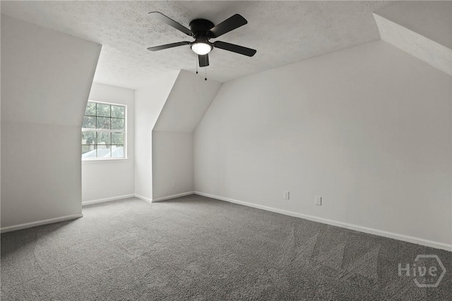 217 Bordeaux Ln, Savannah, GA 31419 - bonus room featuring a textured ceiling, vaulted ceiling, carpet, and a ceiling fan