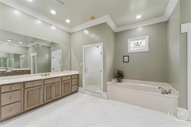 45 Shore Rd, Savannah, GA 31419 - full bathroom with ornamental molding, a garden tub, vanity, a shower stall, and tile patterned flooring