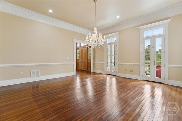 45 Shore Rd, Savannah, GA 31419 - unfurnished room with french doors, a chandelier, hardwood / wood-style floors, crown molding, and recessed lighting