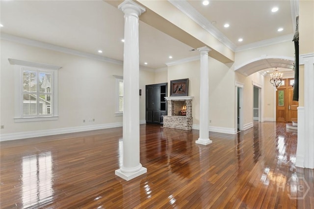 45 Shore Rd, Savannah, GA 31419 - unfurnished living room with hardwood / wood-style floors, a fireplace, ornamental molding, and recessed lighting
