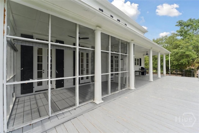 45 Shore Rd, Savannah, GA 31419 - wooden deck with french doors, a ceiling fan, and a sunroom