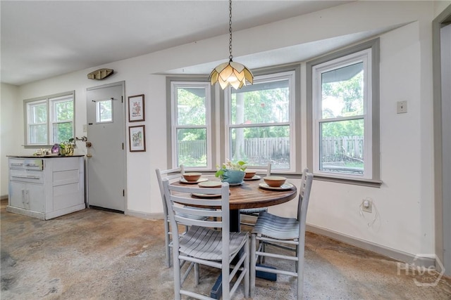 7012 Sandnettles Dr, Savannah, GA 31410 - dining area featuring concrete floors and baseboards