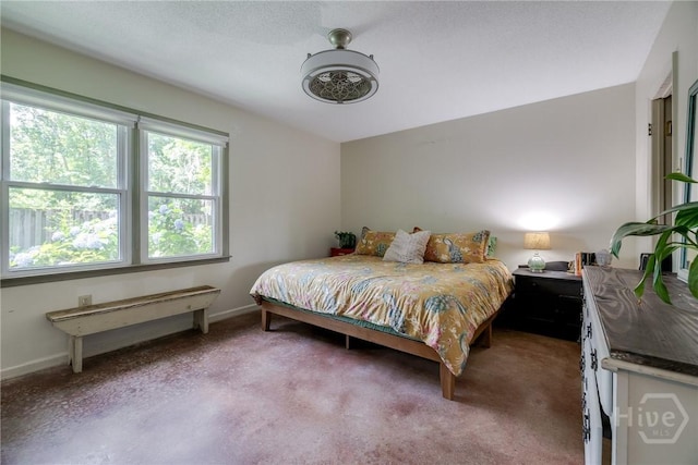 7012 Sandnettles Dr, Savannah, GA 31410 - bedroom featuring light carpet and baseboards