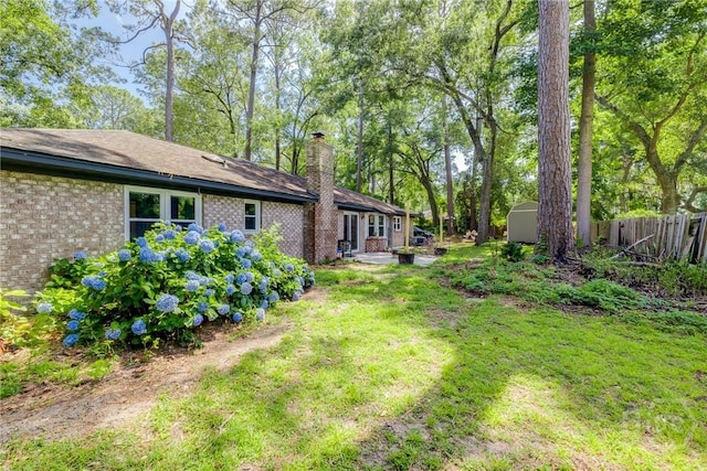 7012 Sandnettles Dr, Savannah, GA 31410 - view of yard featuring a storage shed