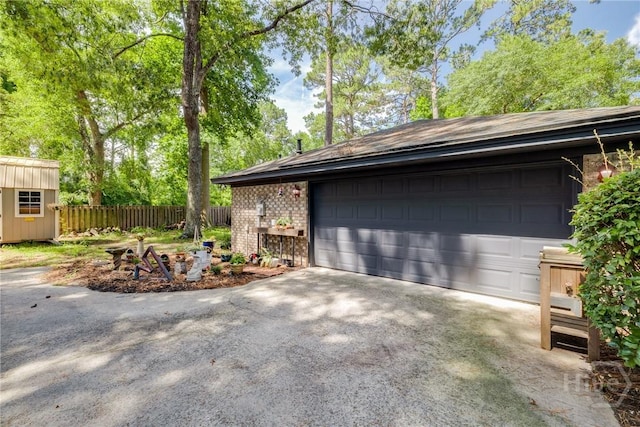 7012 Sandnettles Dr, Savannah, GA 31410 - garage featuring a shed