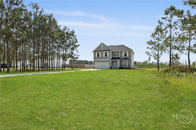 1447 Arnold Dr SE, Allenhurst, GA 31301 - traditional-style home with concrete driveway, an attached garage, and a front lawn