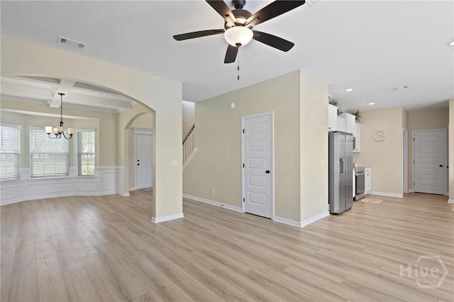 1447 Arnold Dr SE, Allenhurst, GA 31301 - unfurnished living room with ceiling fan, arched walkways, a chandelier, light wood finished floors, and recessed lighting