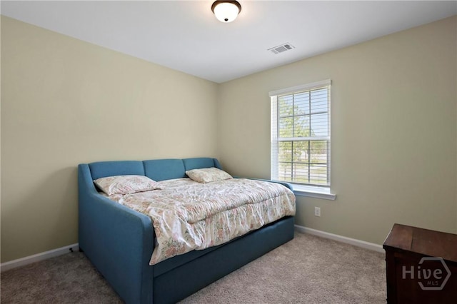 1447 Arnold Dr SE, Allenhurst, GA 31301 - carpeted bedroom featuring baseboards