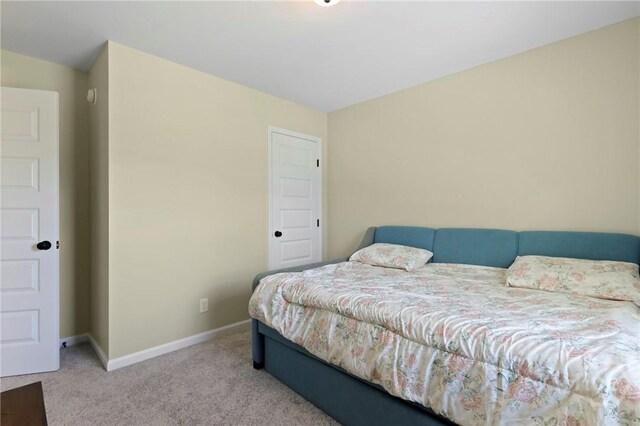 1447 Arnold Dr SE, Allenhurst, GA 31301 - carpeted bedroom featuring baseboards
