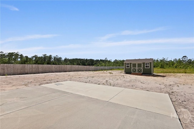 1447 Arnold Dr SE, Allenhurst, GA 31301 - view of patio / terrace featuring a storage shed