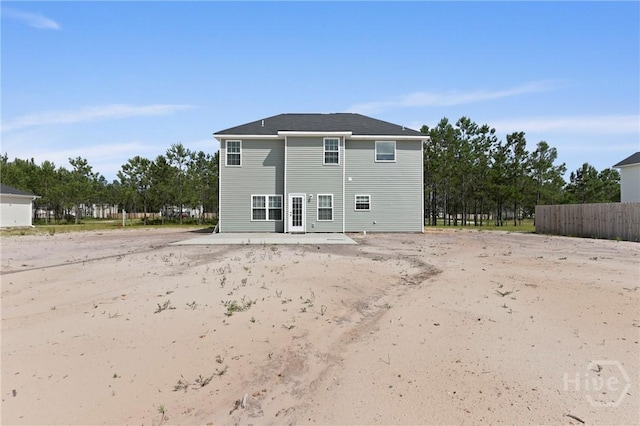 1447 Arnold Dr SE, Allenhurst, GA 31301 - rear view of house with a patio area