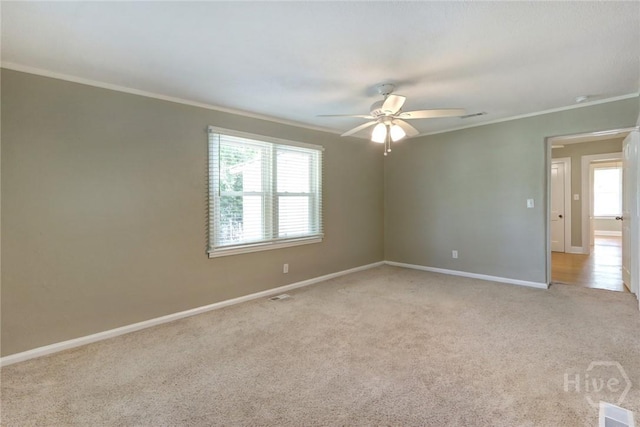 416 E 61st St, Savannah, GA 31405 - unfurnished room featuring ornamental molding, light carpet, and ceiling fan