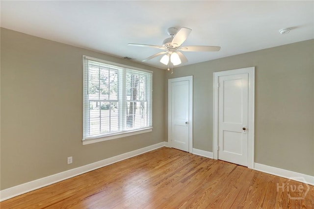 416 E 61st St, Savannah, GA 31405 - unfurnished bedroom featuring light wood finished floors and a ceiling fan