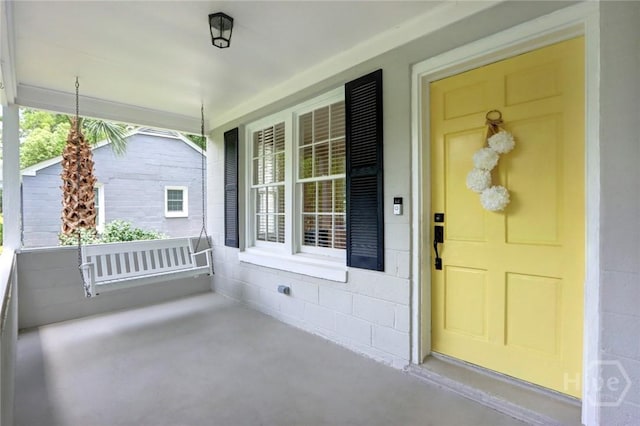 416 E 61st St, Savannah, GA 31405 - entrance to property with a porch and concrete block siding
