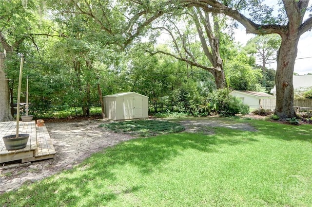 416 E 61st St, Savannah, GA 31405 - view of yard with a storage shed