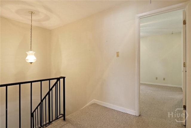 455 Mall Blvd Unit 39, Savannah, GA 31406 - hallway with carpet floors and an upstairs landing