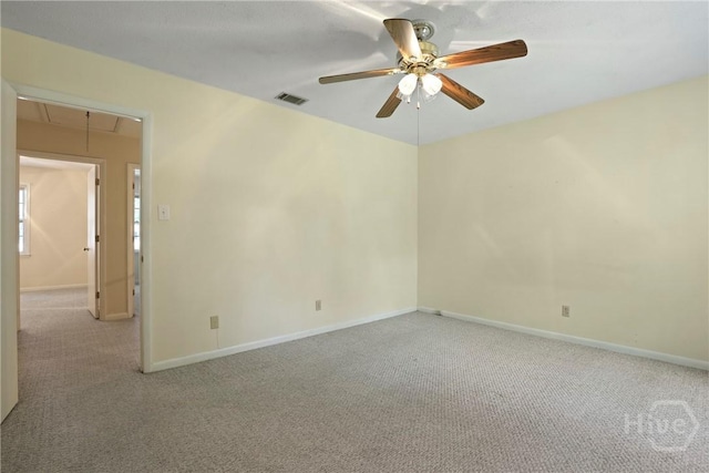 455 Mall Blvd Unit 39, Savannah, GA 31406 - spare room featuring attic access, carpet, and ceiling fan