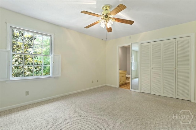 455 Mall Blvd Unit 39, Savannah, GA 31406 - unfurnished bedroom with carpet floors, a closet, ensuite bath, and a ceiling fan