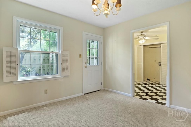 455 Mall Blvd Unit 39, Savannah, GA 31406 - entrance foyer featuring a chandelier, carpet flooring, and tile patterned floors