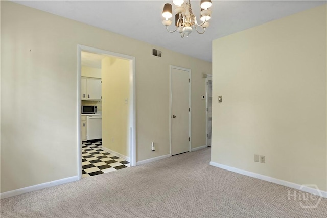 455 Mall Blvd Unit 39, Savannah, GA 31406 - unfurnished room featuring a chandelier and light colored carpet